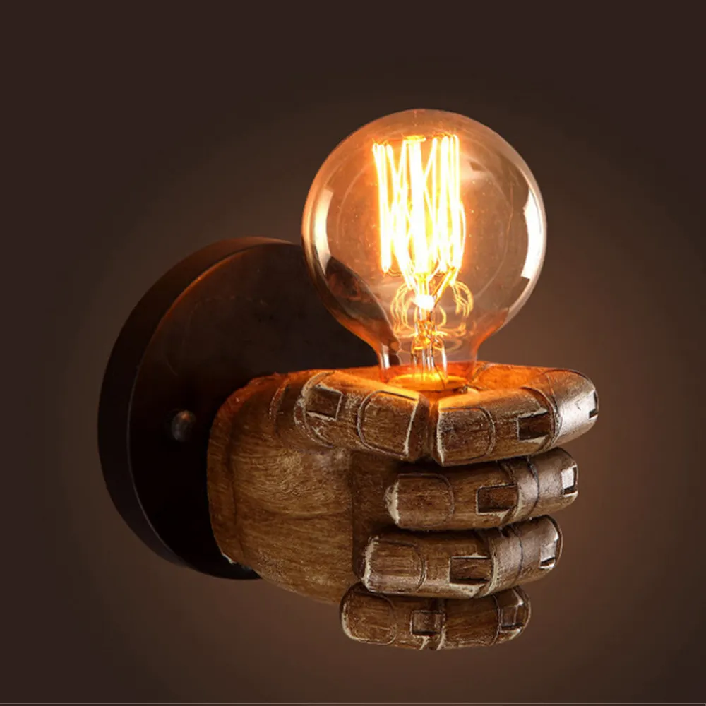 Fist resin wall lamp creates decorative