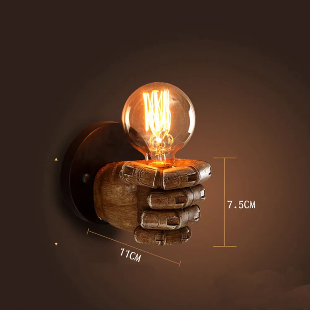 Fist resin wall lamp creates decorative