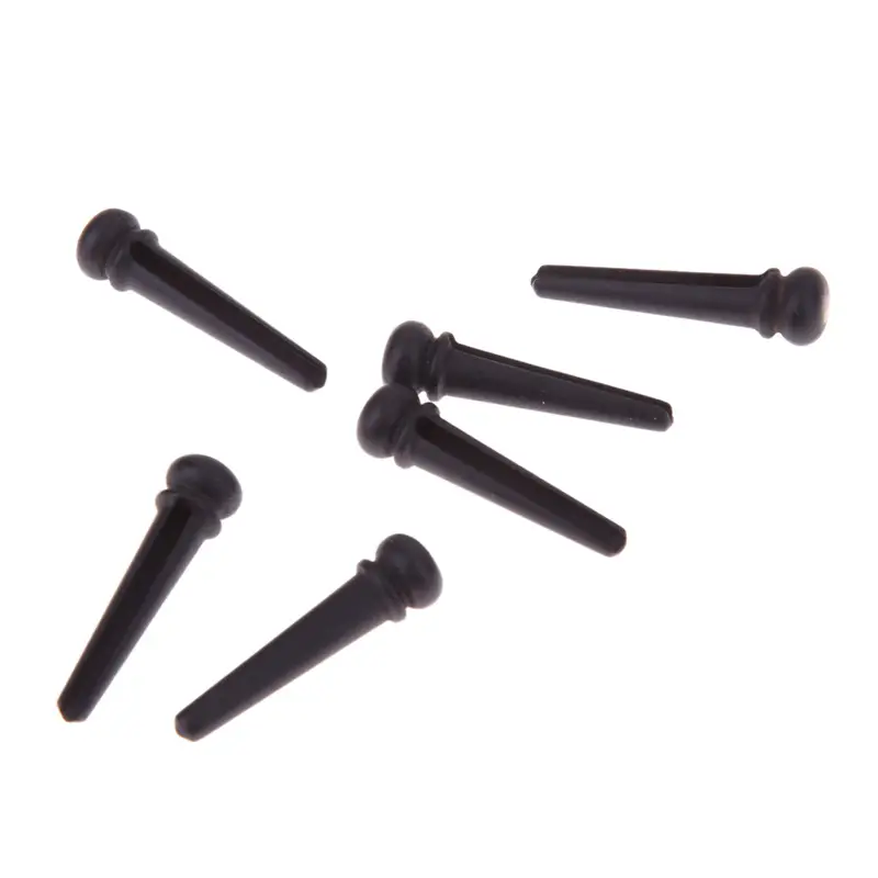 Guitar string nail pressing string post
