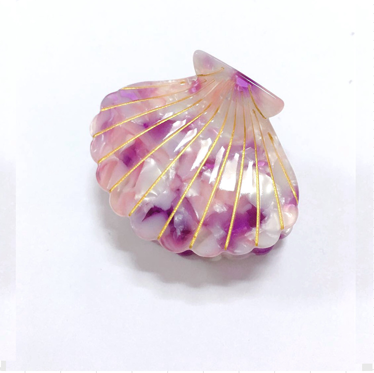 Women’s shell catch clip headdress