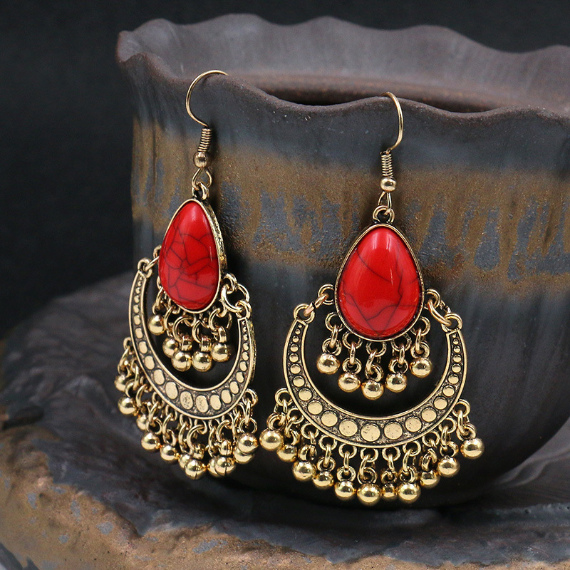 Tassel earrings with golden beads