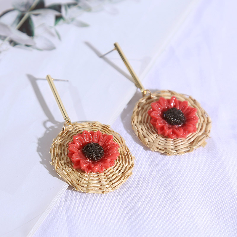 Long geometric rattan flower earrings