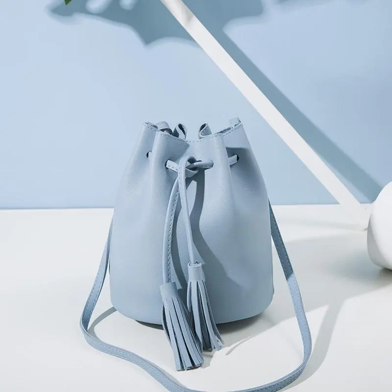 Women's fashion match color consistent wine rubber rope bucket bag - Blue