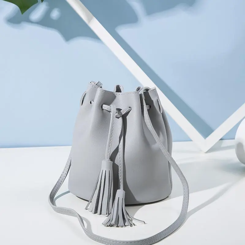 Women's fashion match color consistent wine rubber rope bucket bag - Wine