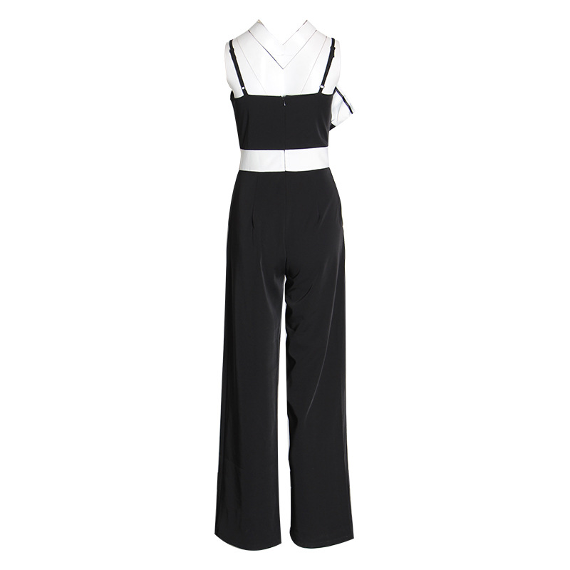 Striped jumpsuit with suspenders and bow