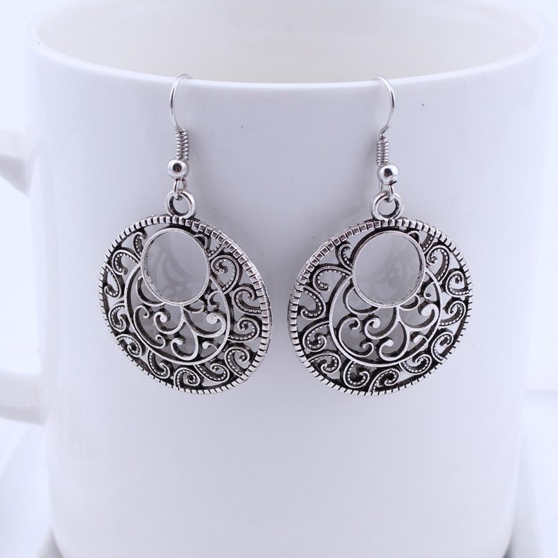 Ethnic style Tibetan silver hollow earrings
