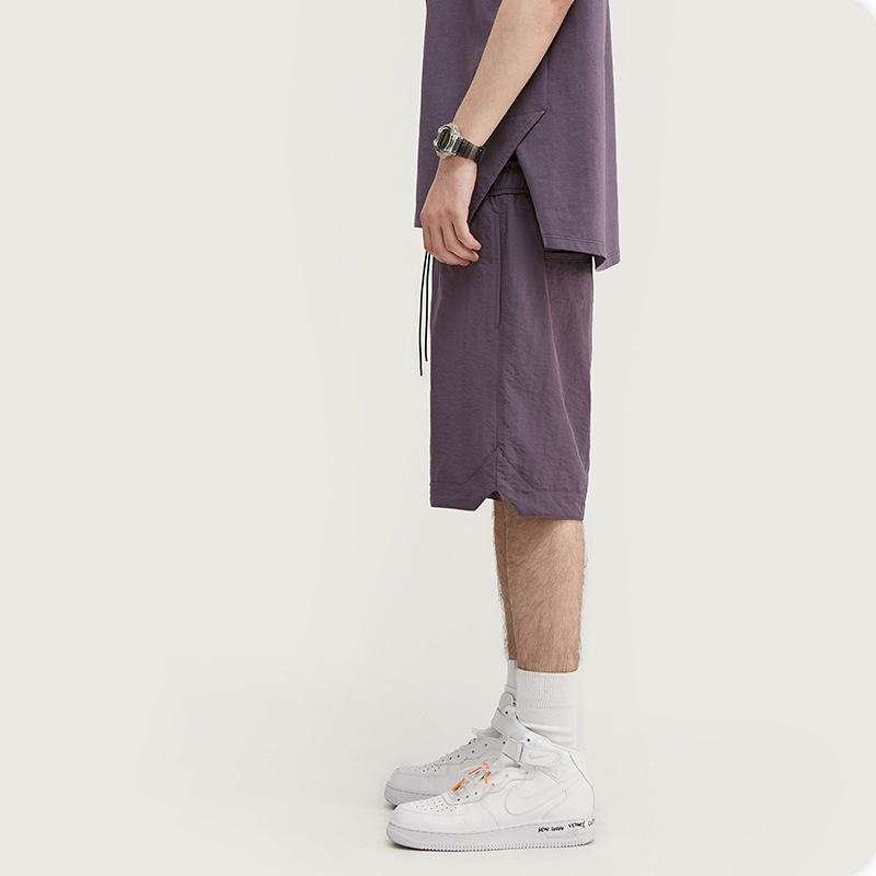 Casual and versatile solid color loose men's shorts
