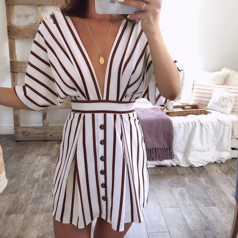 FLEUR Collectie: Jurk met diepe V-hals