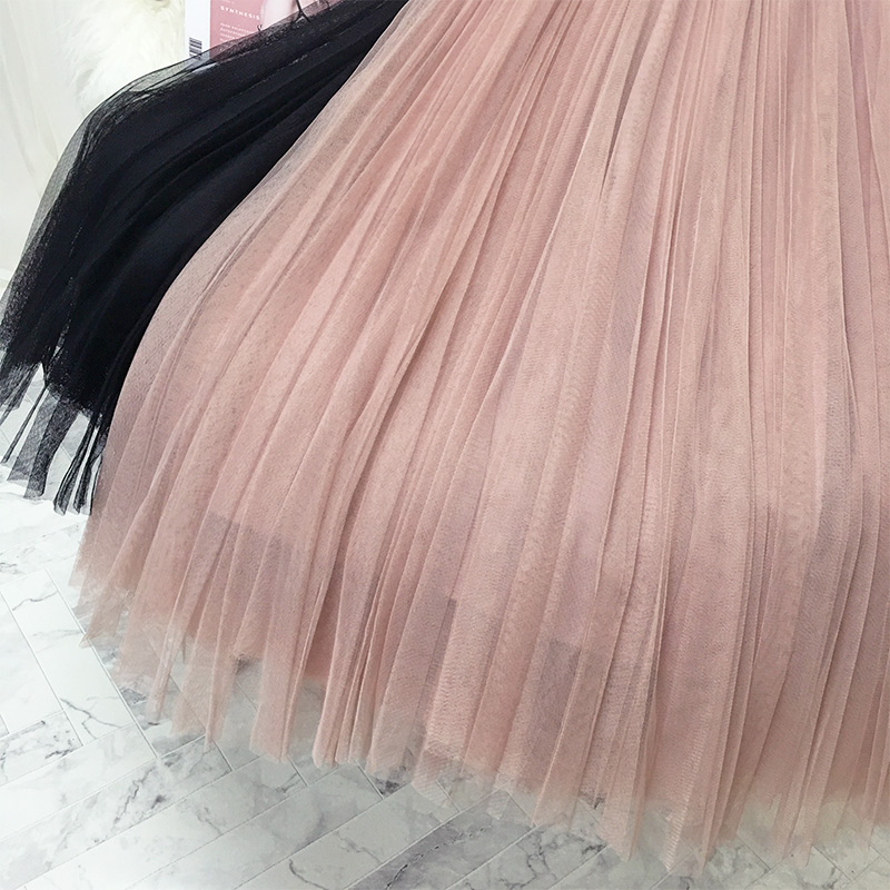 تنورة نسائية بألوان صلبة وتكسيرات