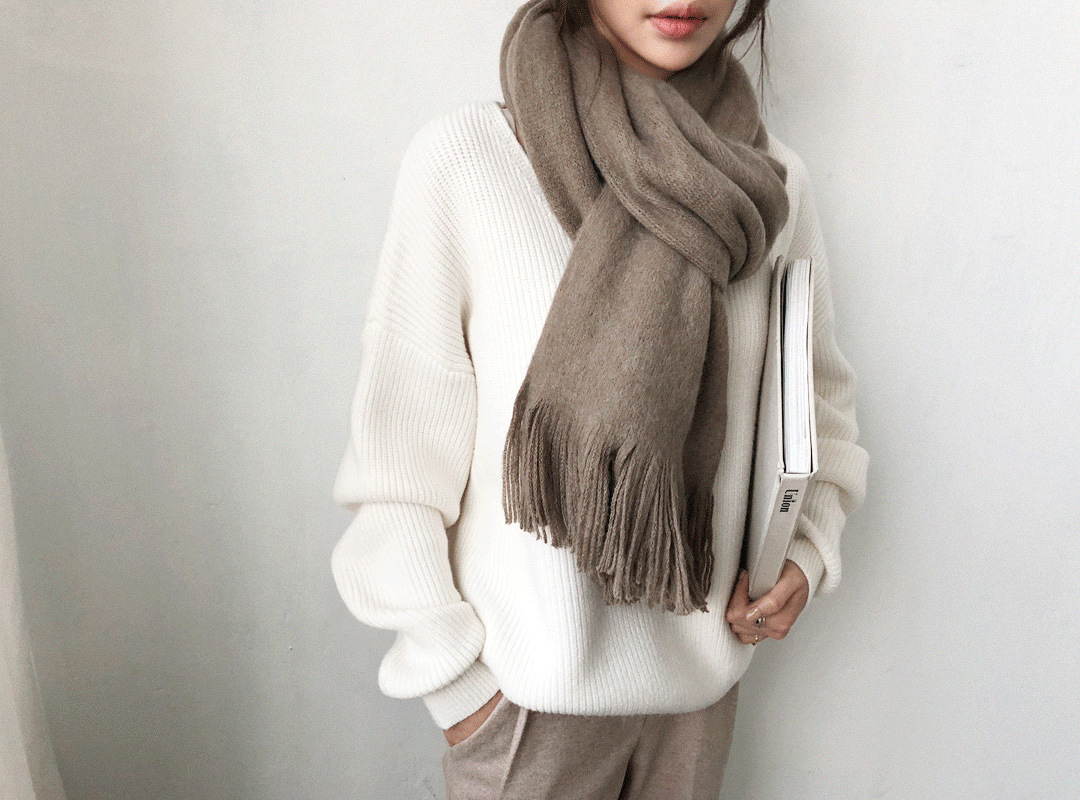 Irregular solid color knitted sweater