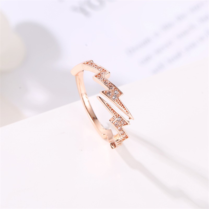 Irregular geometry zircon lightning ring