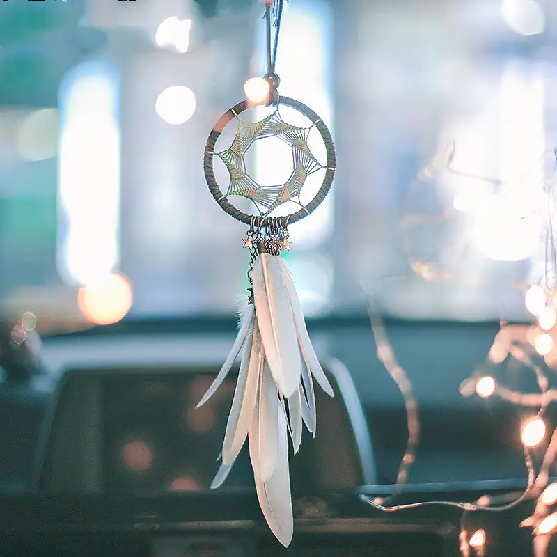 Feather tassel charm