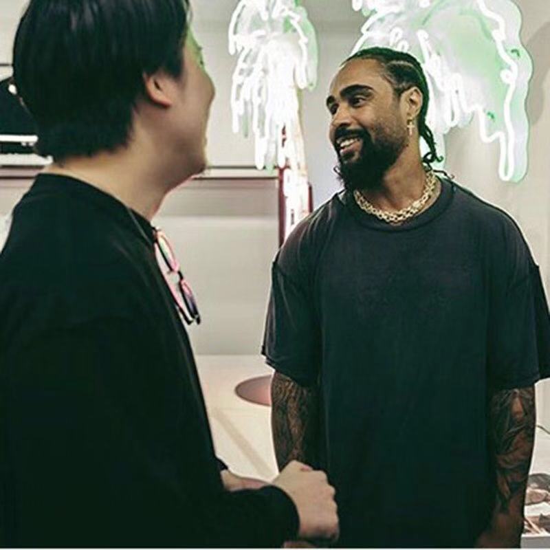 Washed and worn short sleeve T-shirt with five sleeves