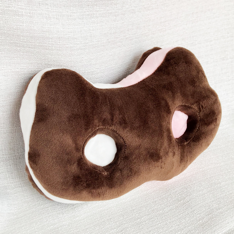 Plush cat shaped cushion