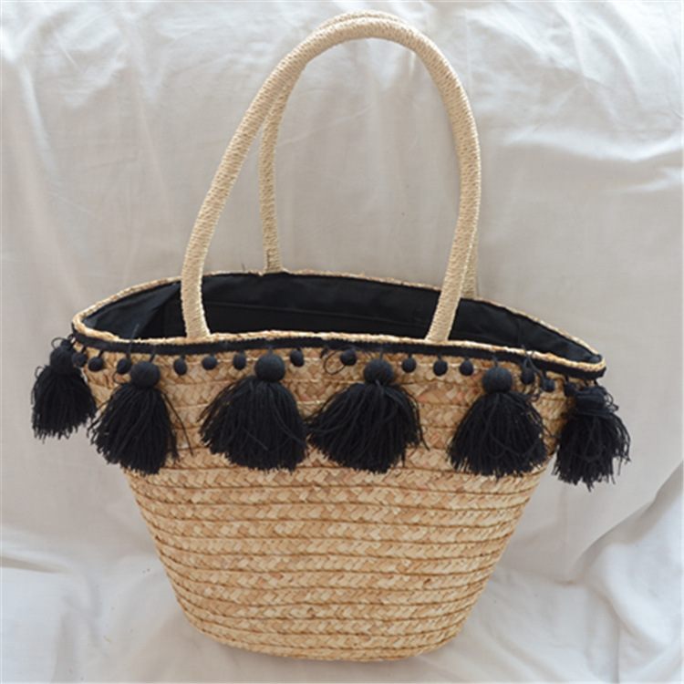 Female hand-woven tassel shoulder bag