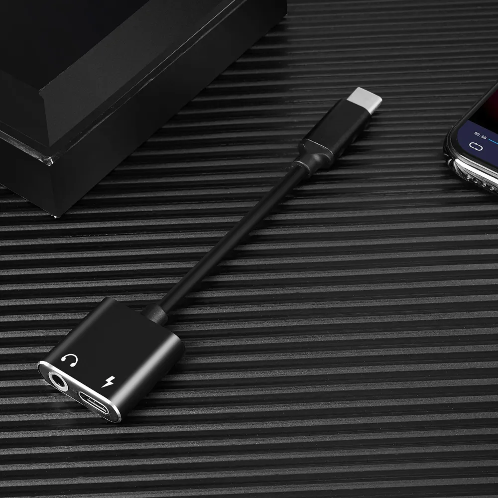 Mobile phone adapter to listen to songs two in one