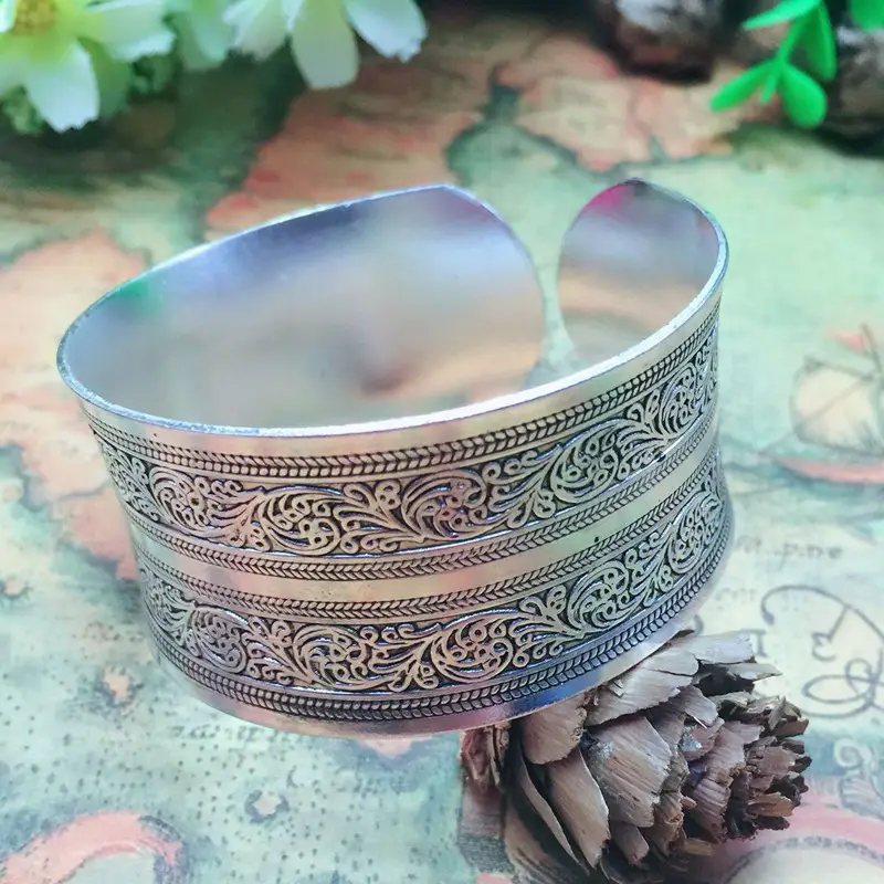 Carved wide-angle Tibetan silver bracelet
