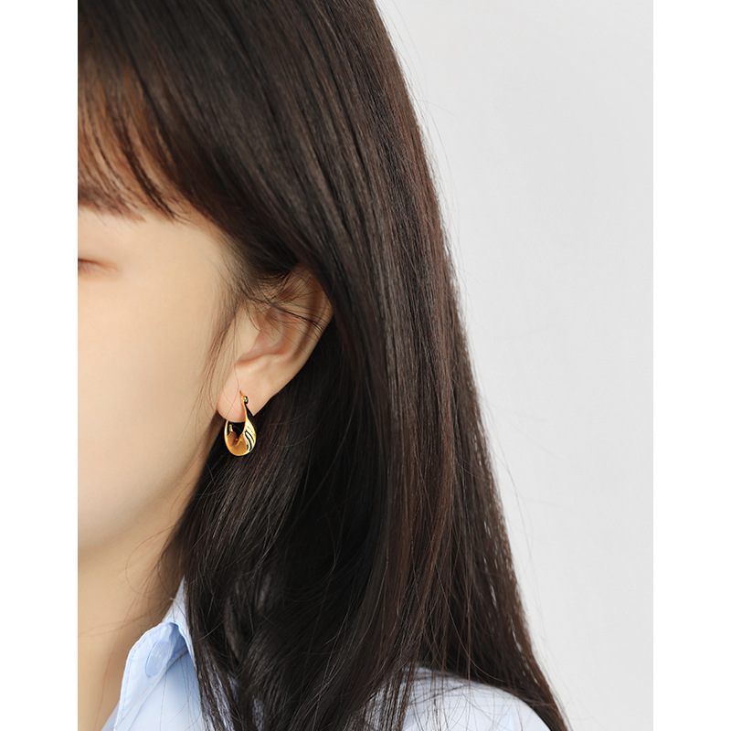 Women's sterling silver glossy twist earrings