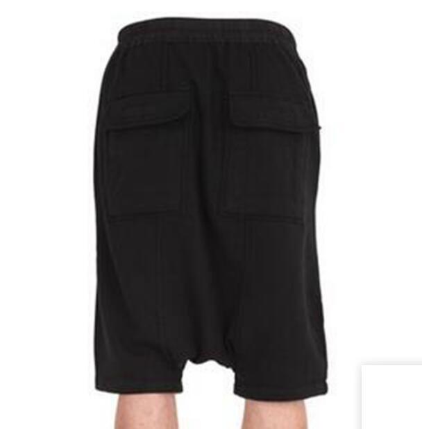 Spring and summer asymmetric low crotch shorts