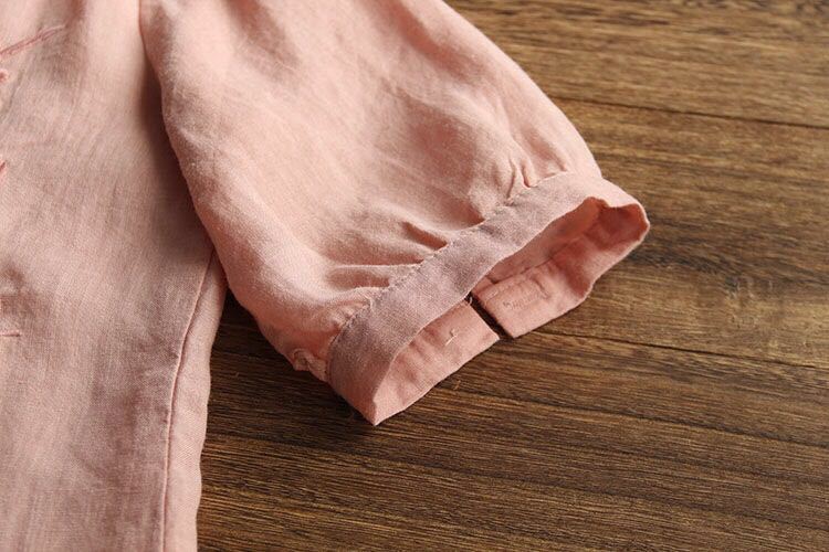 All-embroidered V-neck cotton and linen top