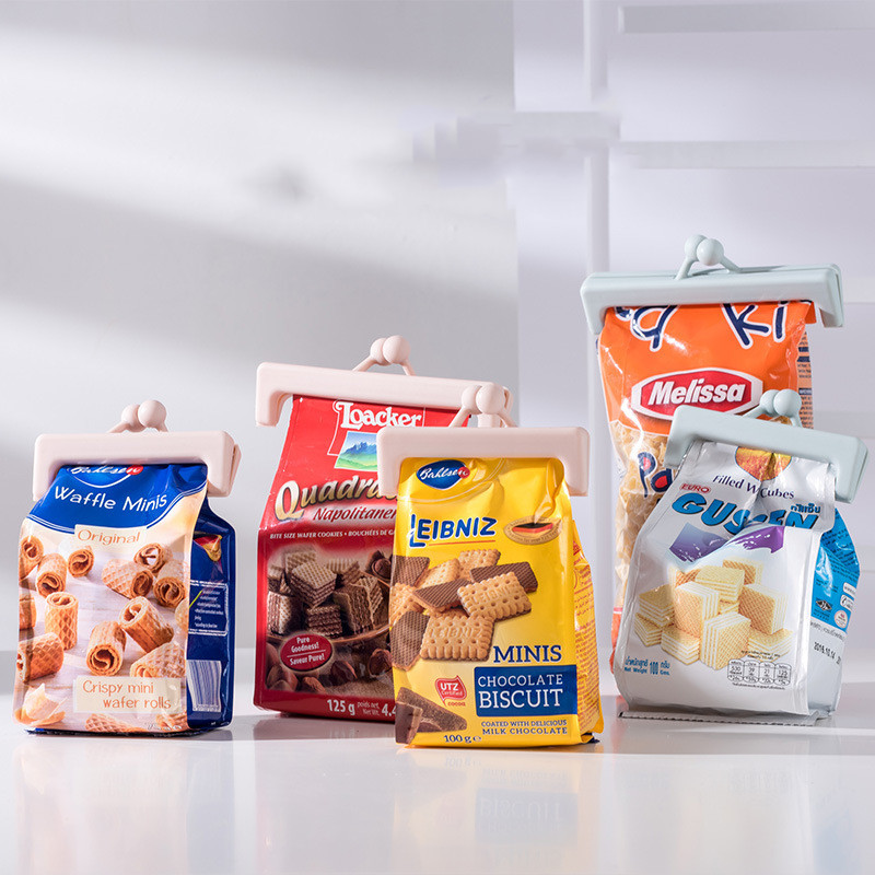 Кнопочный зажим для запечатывания простых пакетов для пищевых продуктов