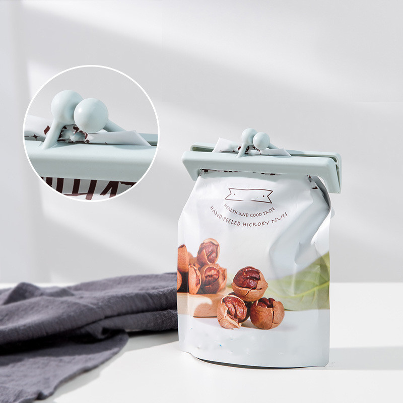 Кнопочный зажим для запечатывания простых пакетов для пищевых продуктов