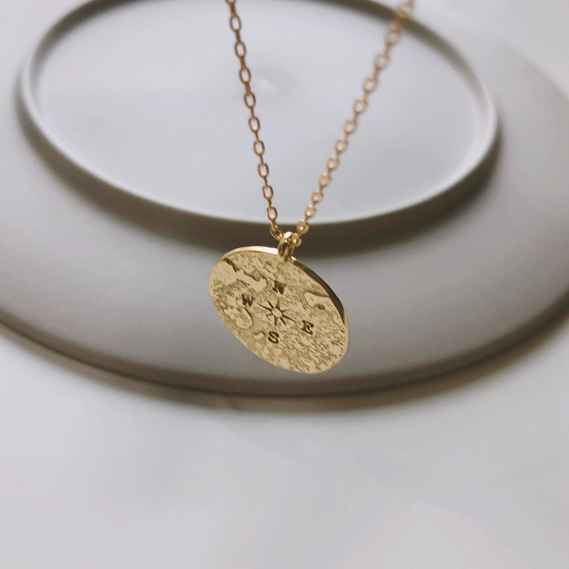 The compass map necklace