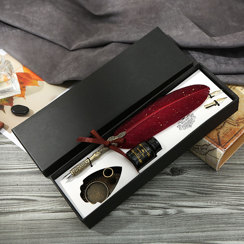 Detailed metal pen grip and glass nib