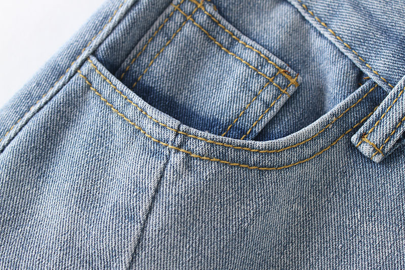 Denim skirt with irregular high waist and hip