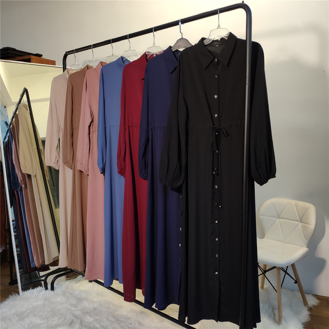 Full-button dress with a neat lapel