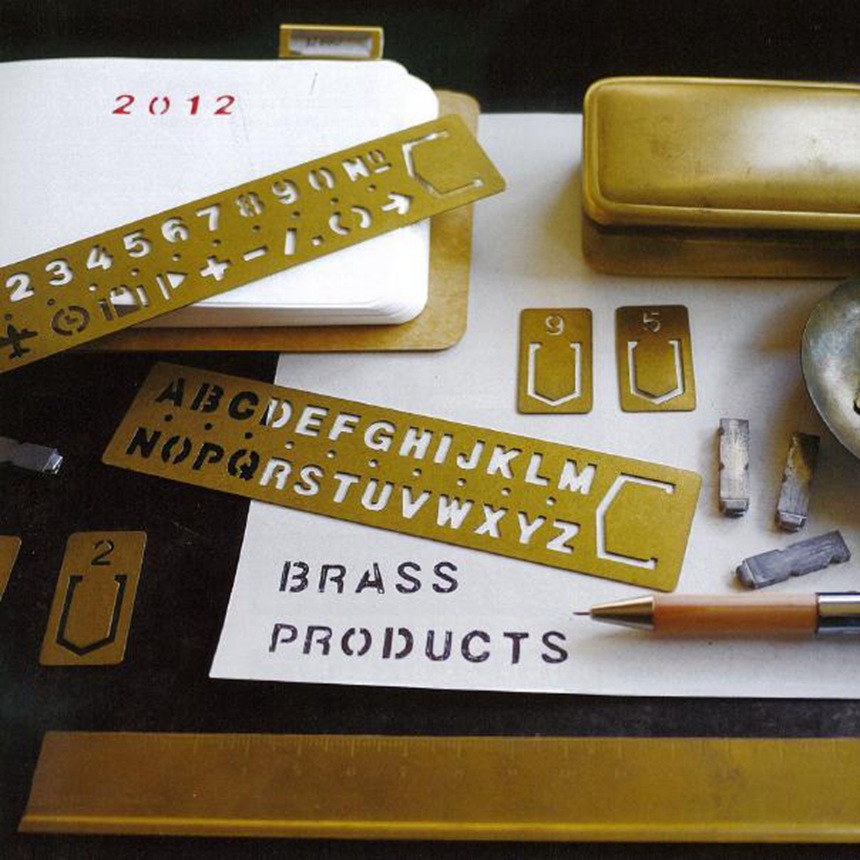 Vintage brass hand account digital letter ruler