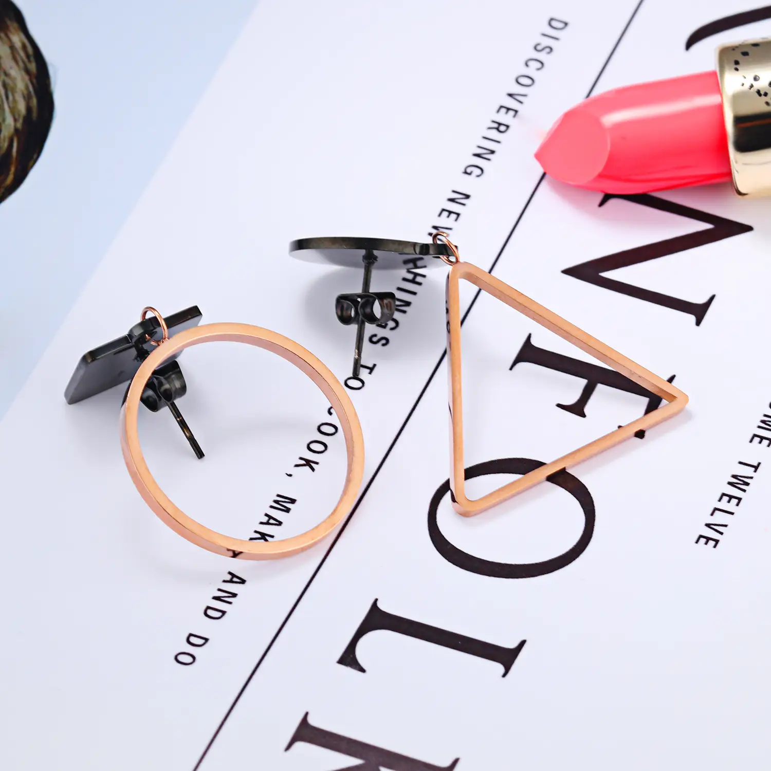 Female golden triangle round earrings
