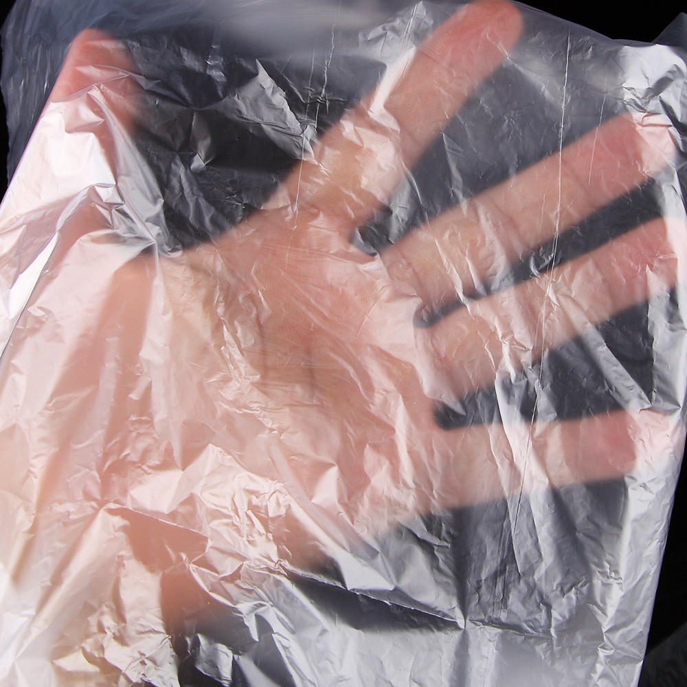 Disposable plastic shawl in barber shop