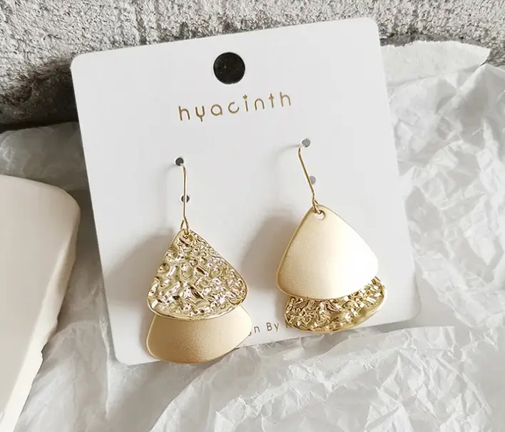 Asymmetrical metal fan-shaped earrings