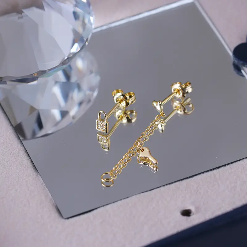 Lock asymmetric earrings