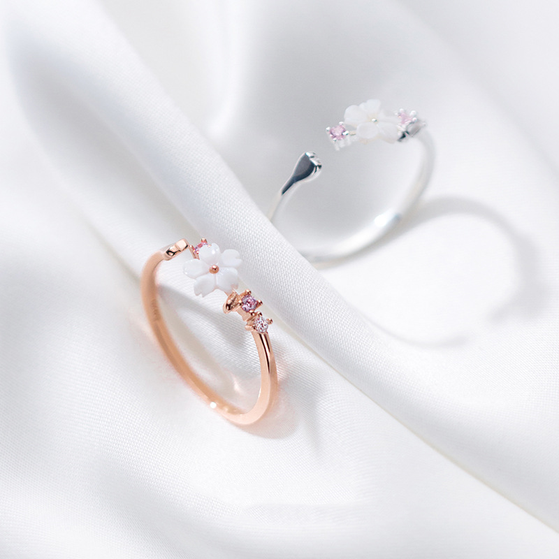 Sweet synthetic shell flower ring