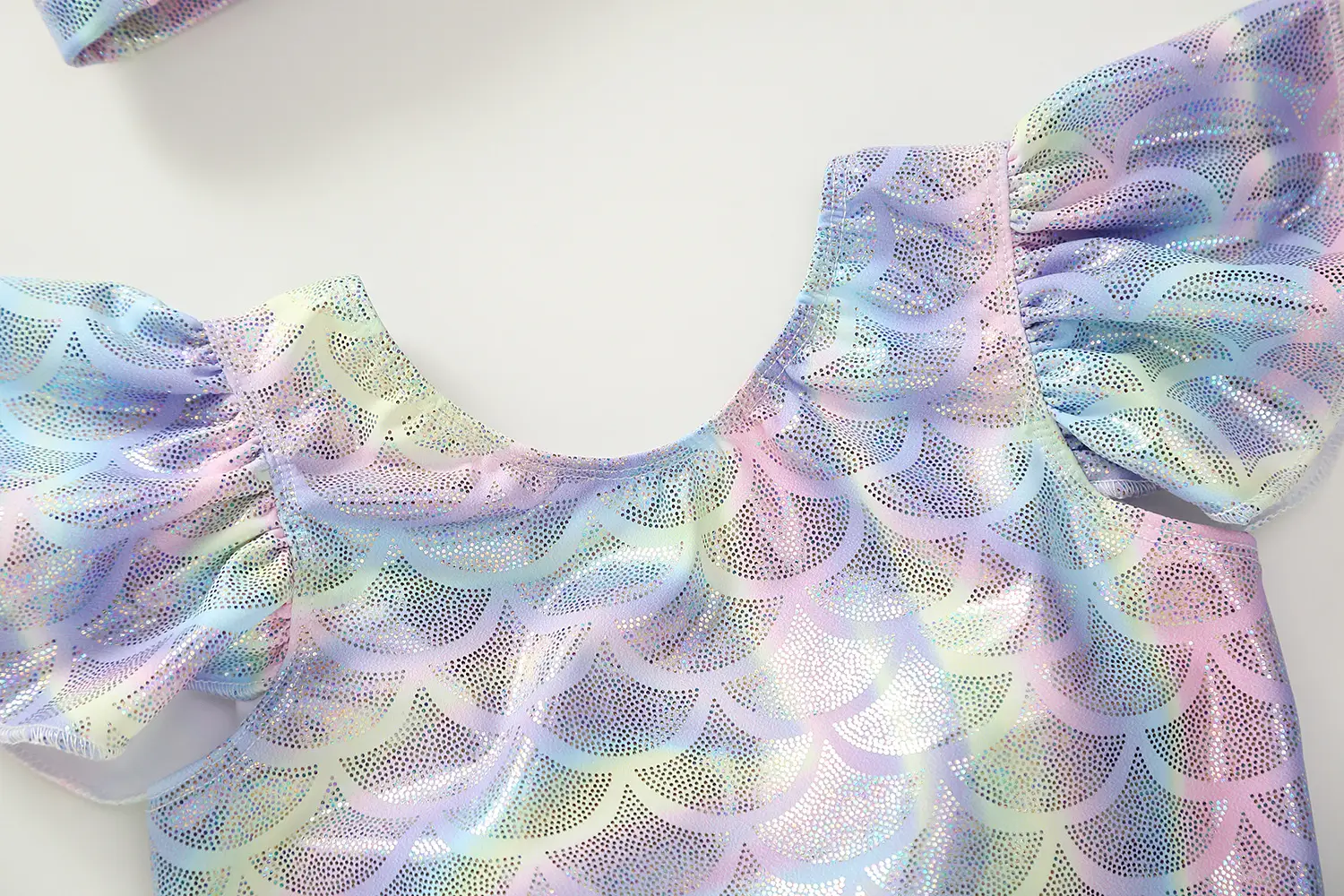 Mermaid swimming in one-piece swimsuit