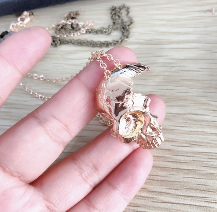 Vintage half face skull necklace