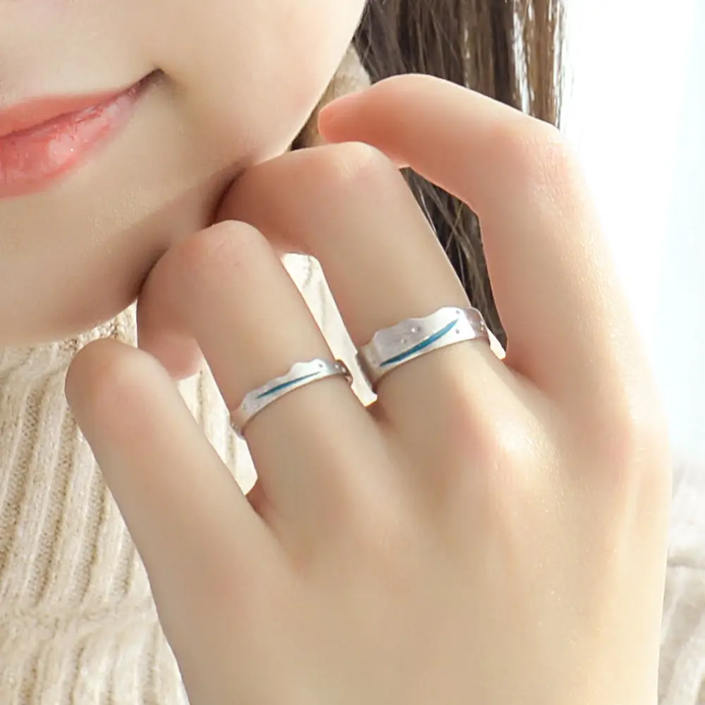 Pair of sterling silver opening ring