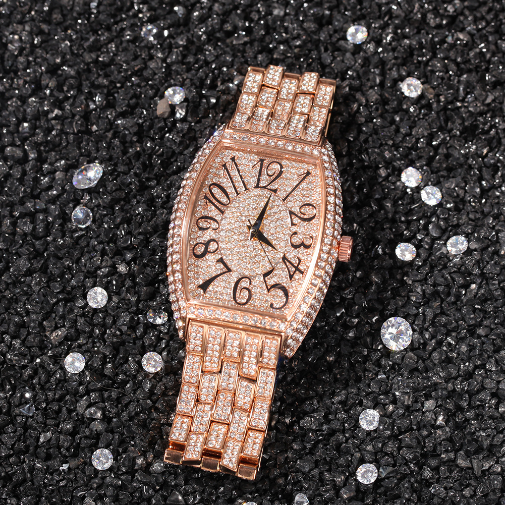 Large tonneau-shaped dial with full diamonds