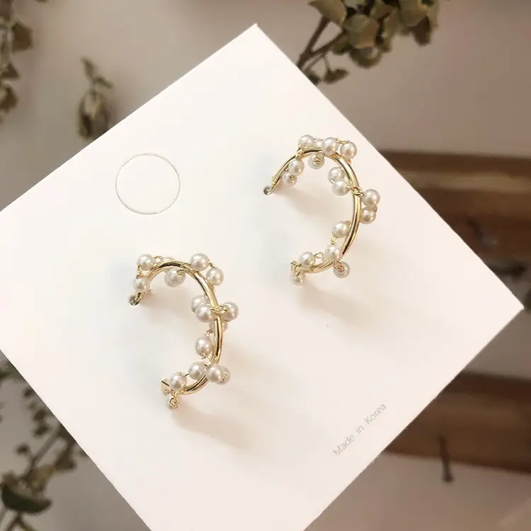 Pearl garland winding semicircular earrings