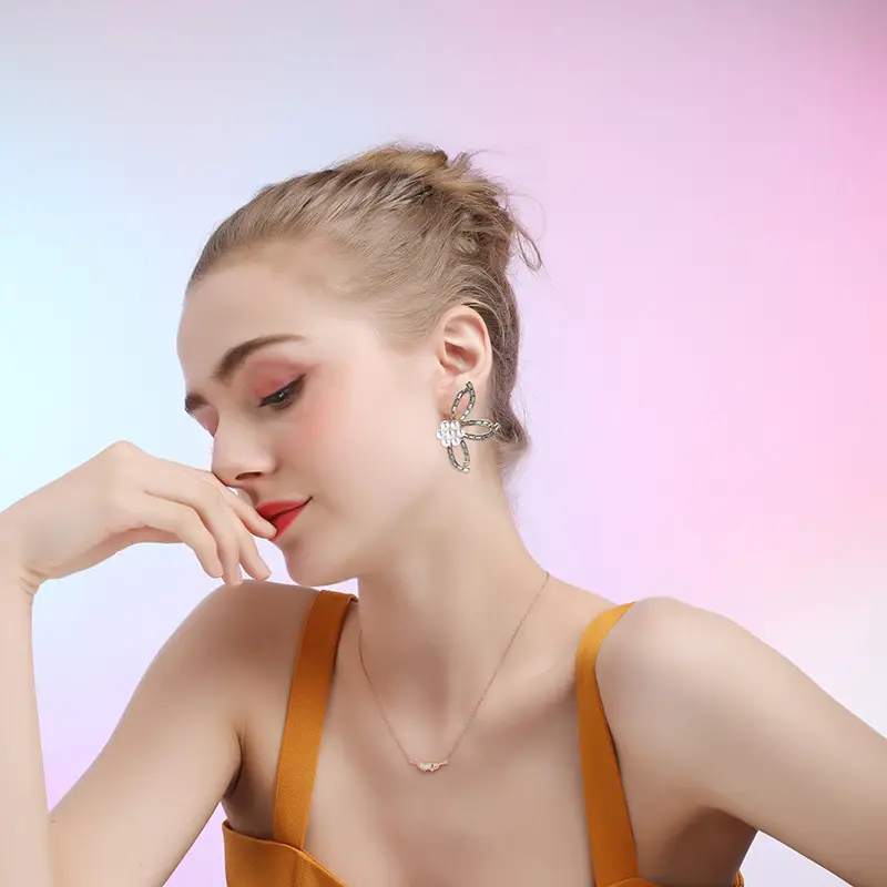 Symmetrical Pearl Flower Stud Earrings