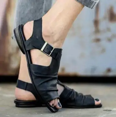 Hollow Roman sandals with a buckle