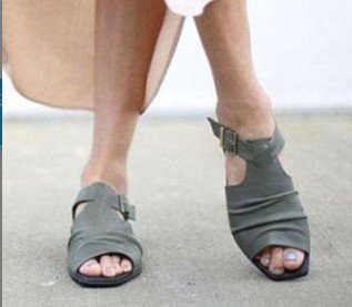 Hollow Roman sandals with a buckle