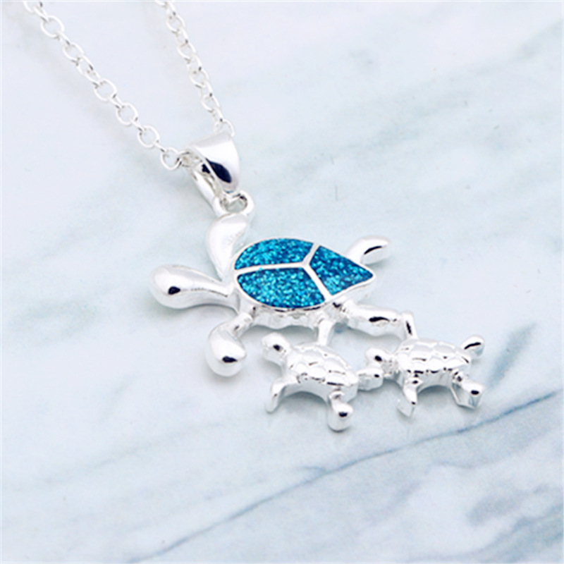 Three turtles female necklace silver pendant