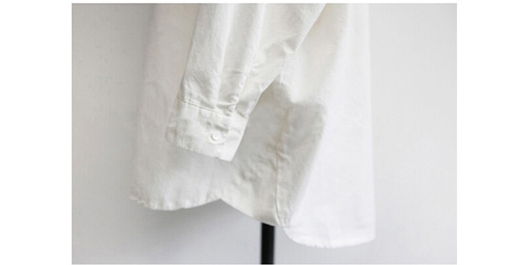 Loose V-neck white shirt