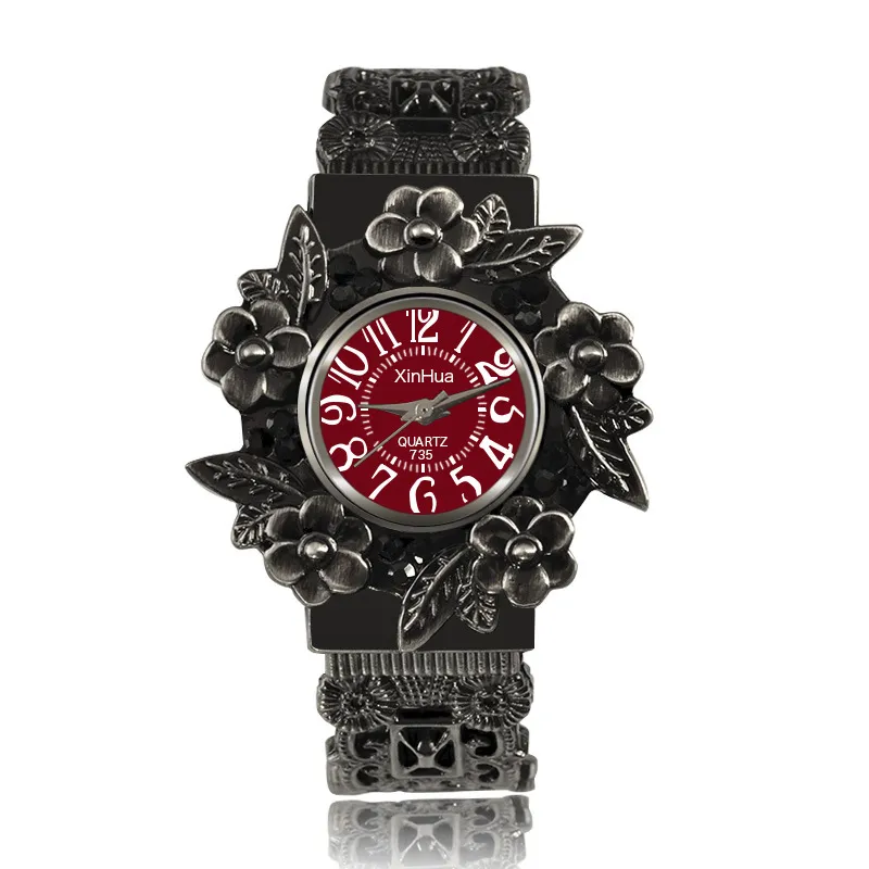 Embossed flower quartz watch