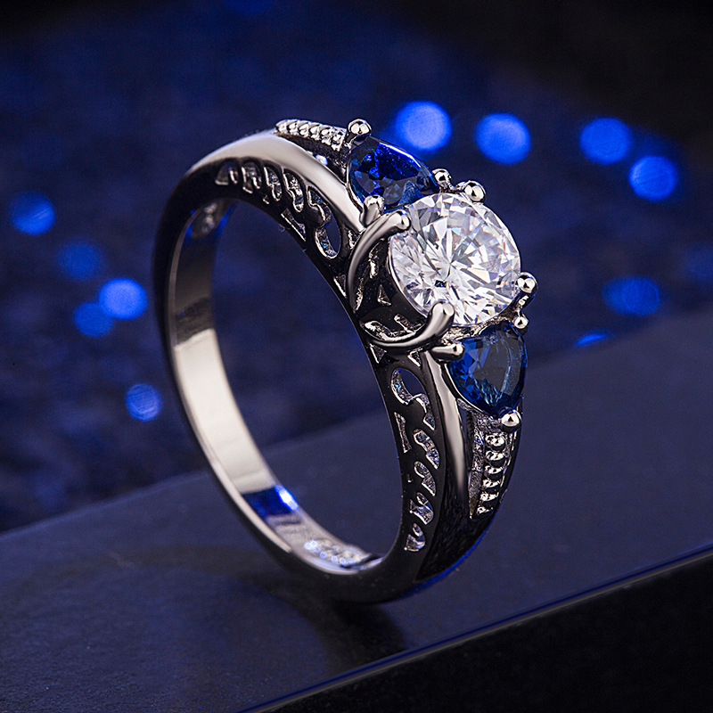 Female heart-shaped blue rhinestone ring
