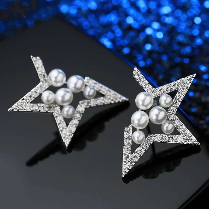 أقراط نجمية أنثوية مزينة باللؤلؤ