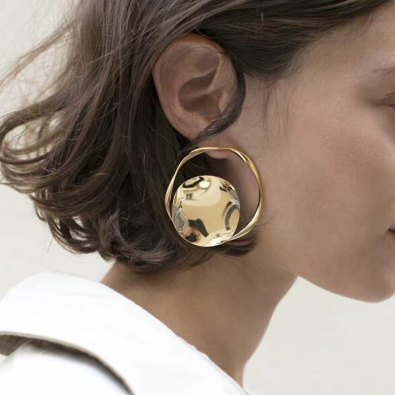 Exaggerated disc vintage earrings